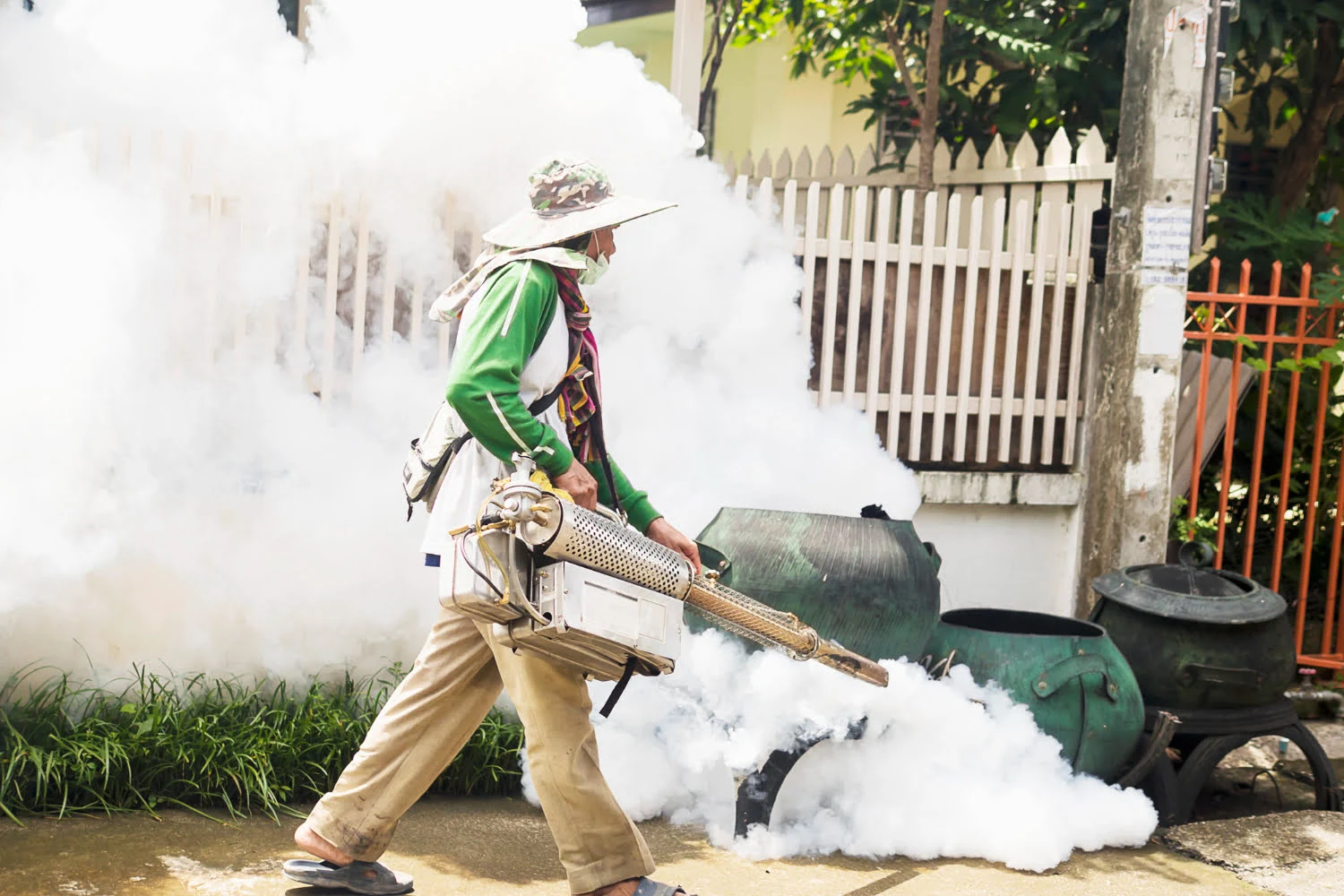 man using thermal fog machine